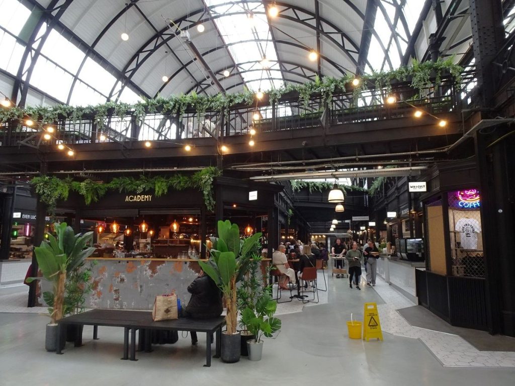 market stalls inside an indoor market hall