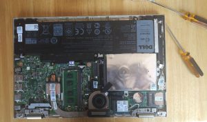 a tablet and laptop side by side on a study desk